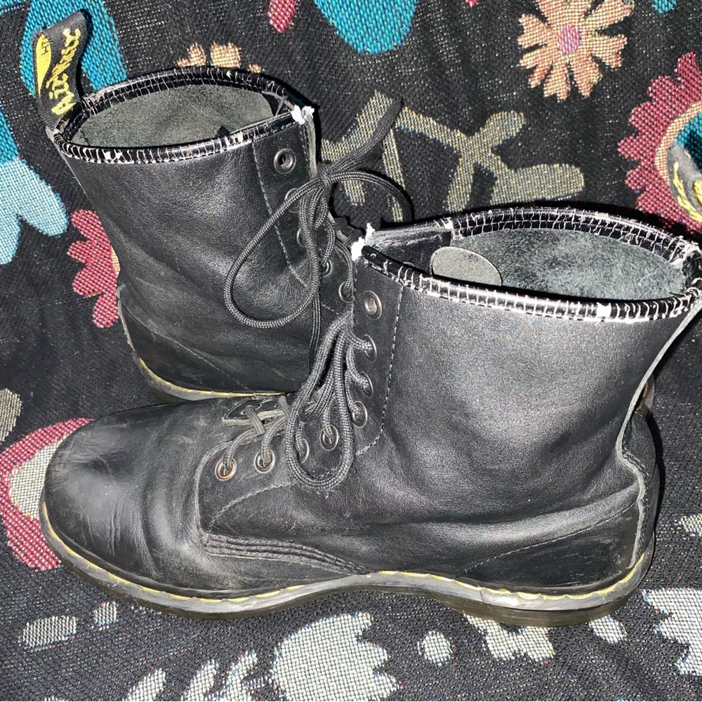 Black dr. marten’s without soles in good condition with wear